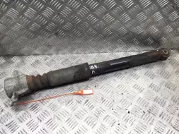 Амортизатор задний левый