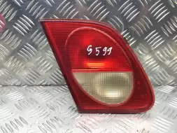 Фонарь крышки багажника левый