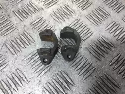 Кронштейн форсунки омывателя фары