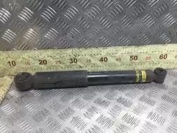 Амортизатор задний левый