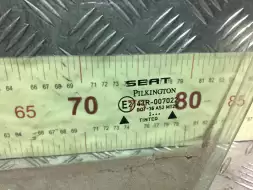 Стекло двери передней левой